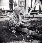 Net Mending at Lord's Cove, NL - 1973