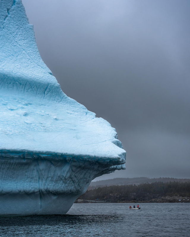 Boat under the Iceberg