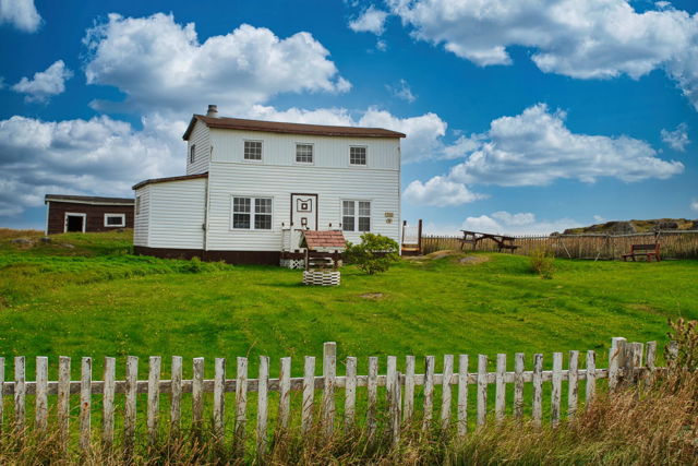 Restored White Tilting Home