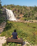 A Quiet Moment by the Falls