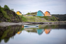 Three Colourful Homes and a Boat
