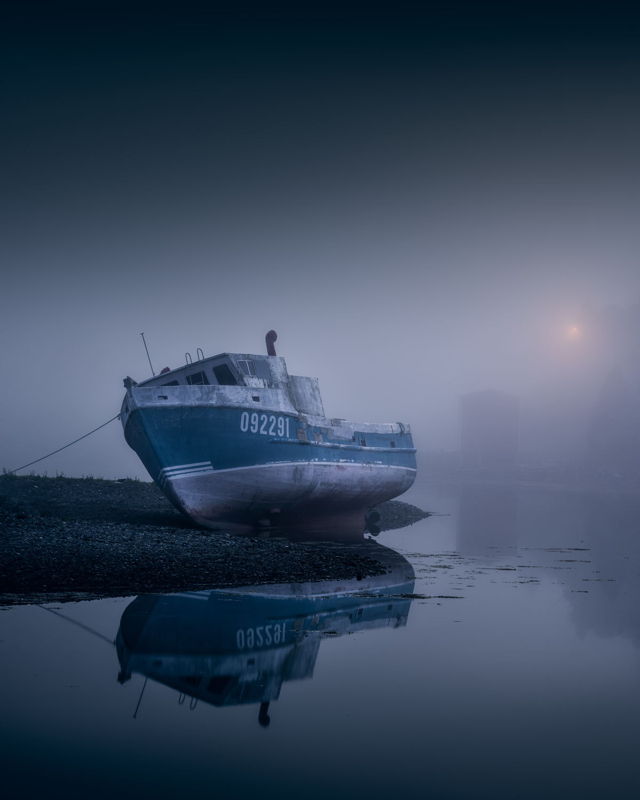 Boat Sits in the Fog