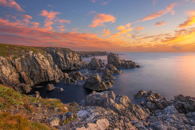 Sunrise Meets The Rocky Shore