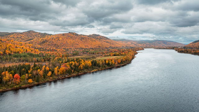 Autumn Serenity Where Mountains Meet the Wate